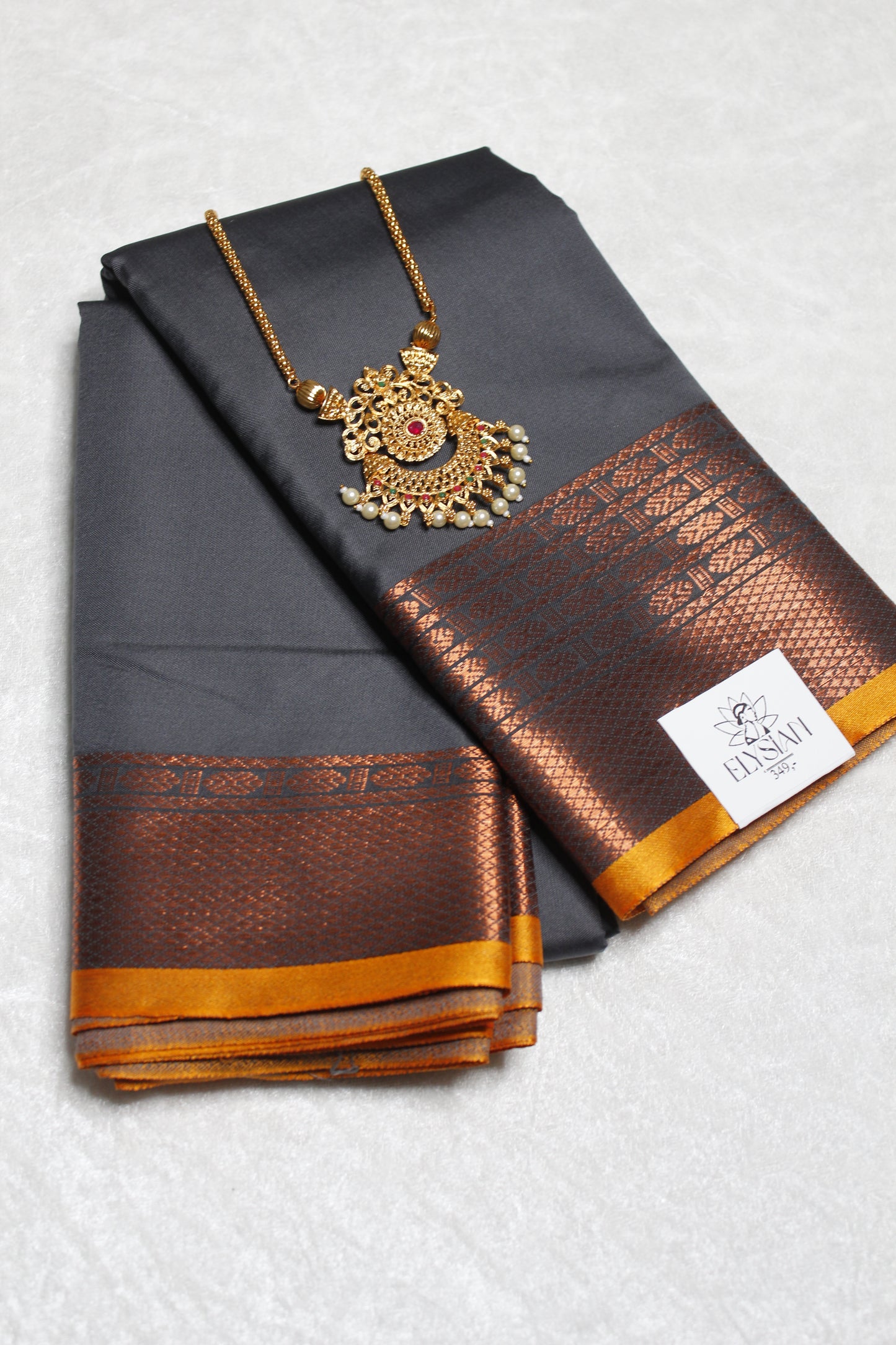 Grey & Orange Crepe Silk Saree