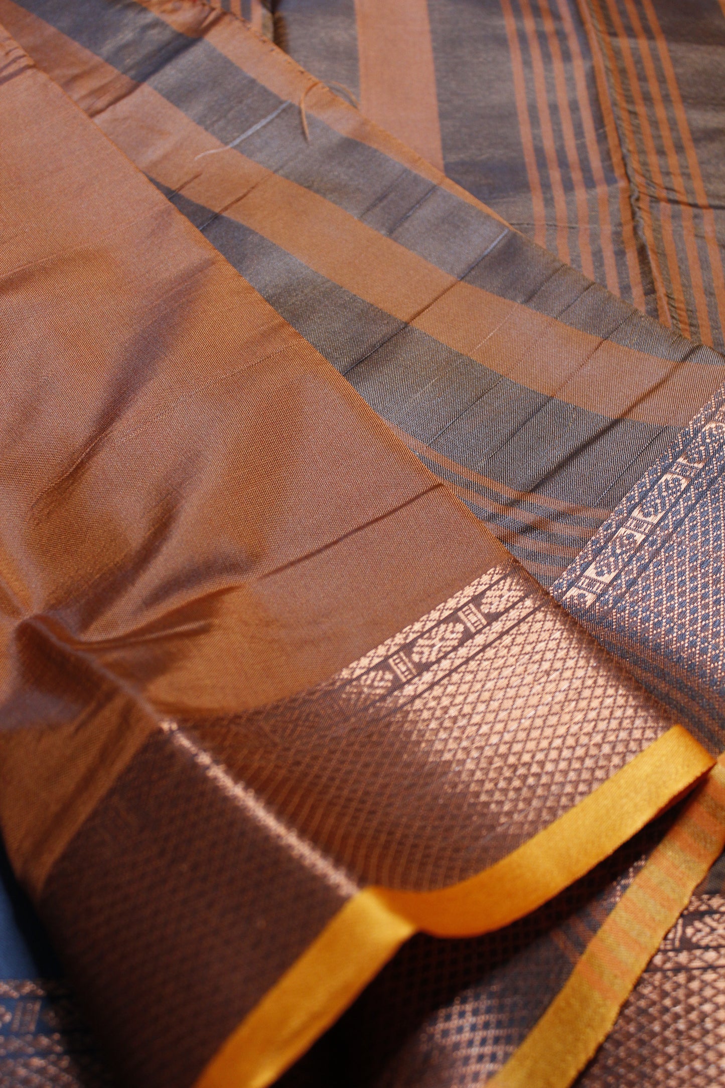 Grey & Orange Crepe Silk Saree