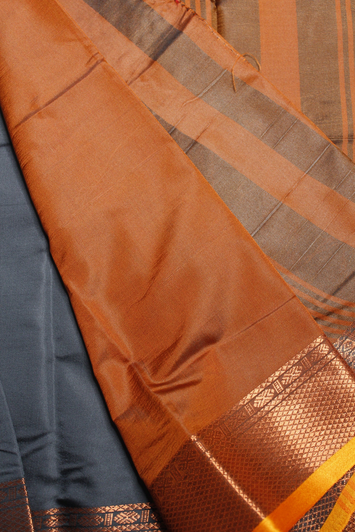 Grey & Orange Crepe Silk Saree